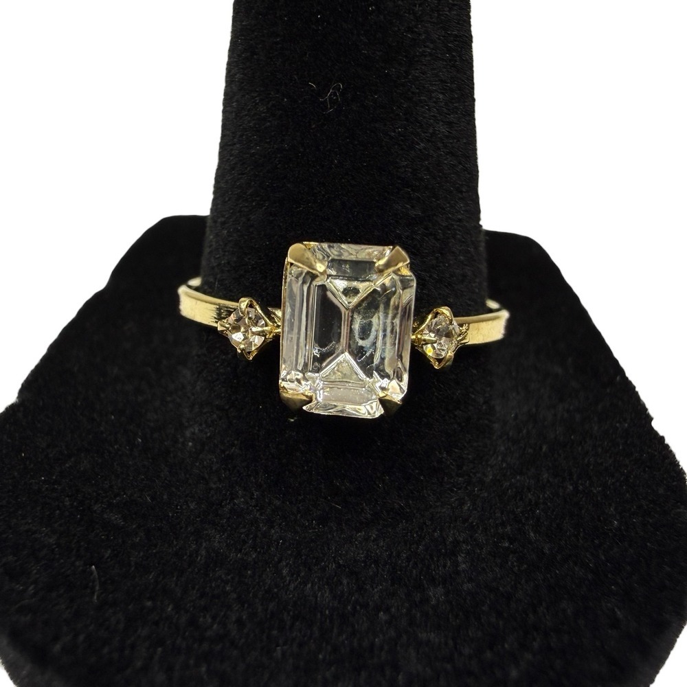 Elegant Gold Tone Emerald Cut Clear Stone Solitaire Ring with Side Accents Sz 9
